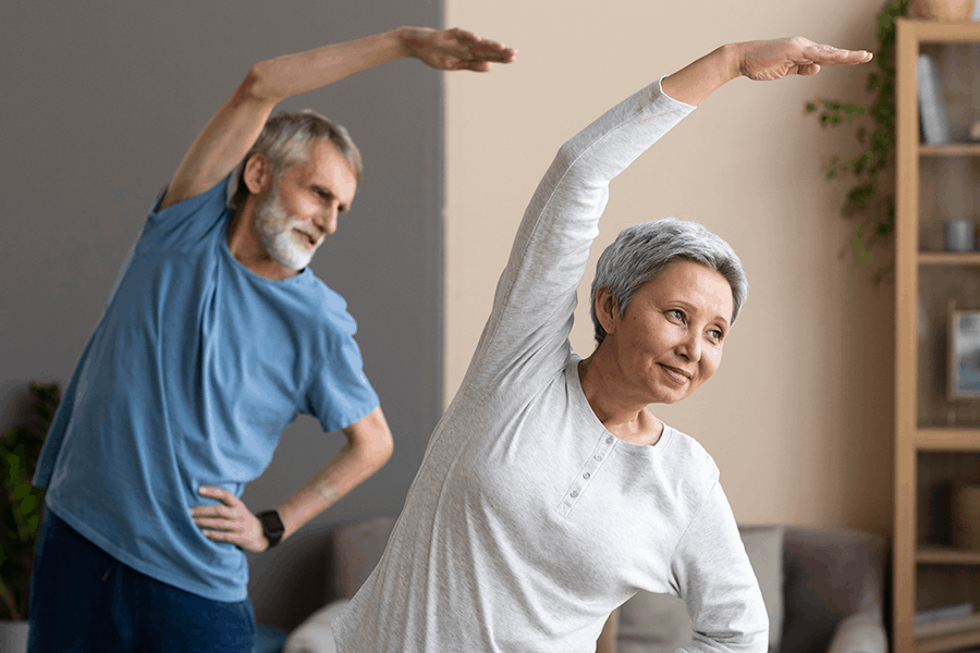 An older couple exercises